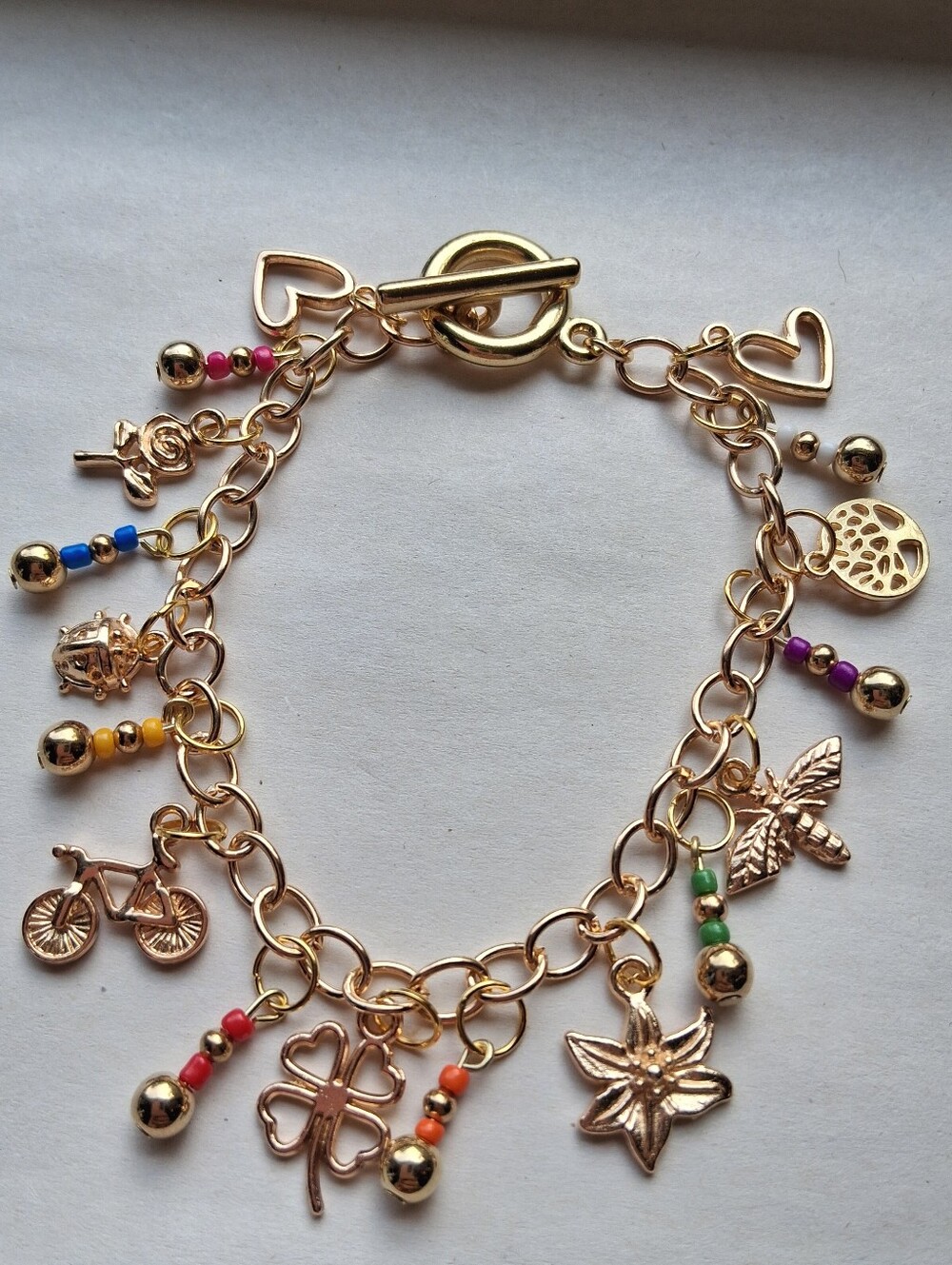 Hand Crafted Gold Charm Bracelet with Multicolor Beads